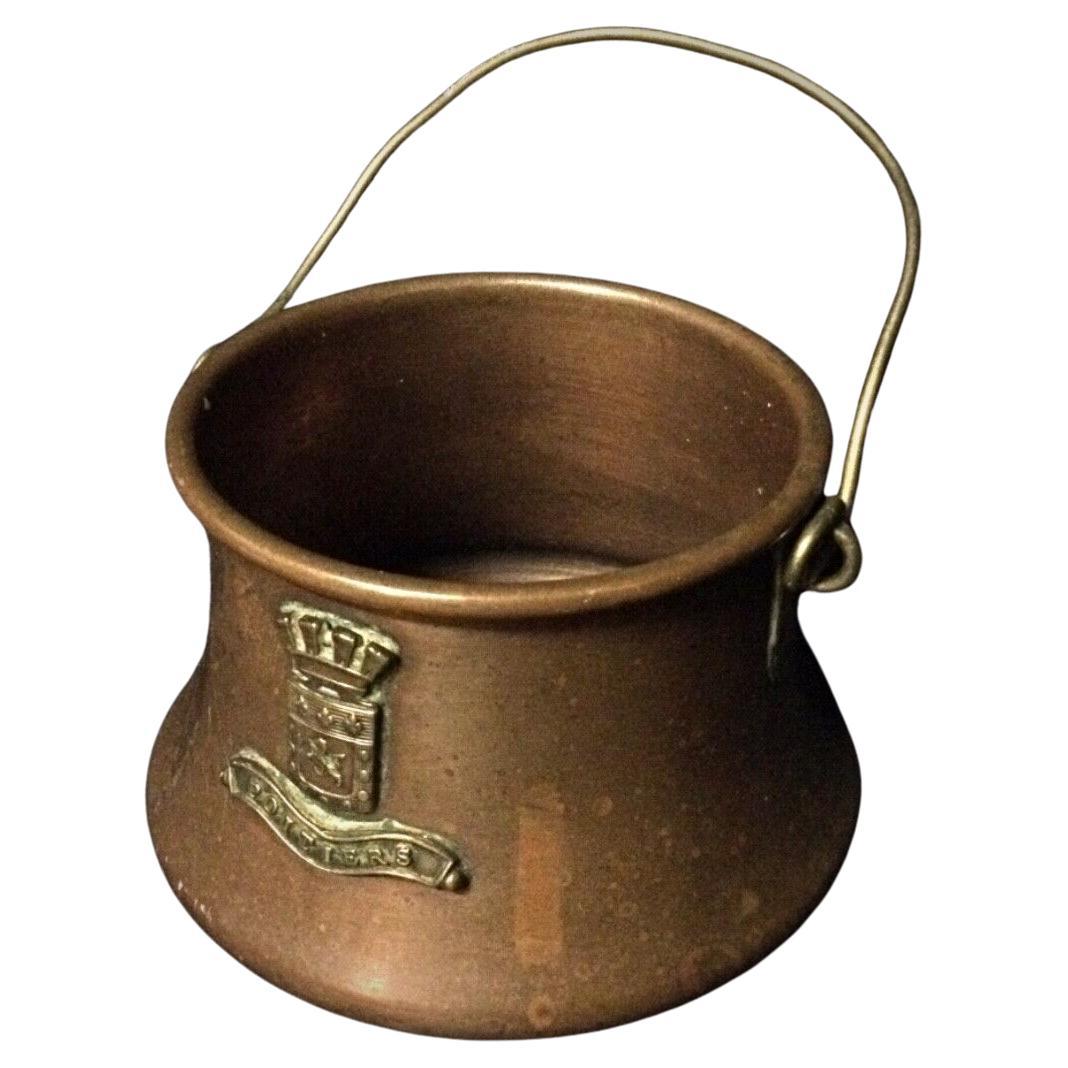 Antique copper cauldron engraved with 'Poitiers,' featuring a rich patina and intricate craftsmanship. A vintage collectible perfect for home decor or adding historical charm to any collection. Diameter: 8 cm (3.1 in), Height: 5 cm (2.0 in).