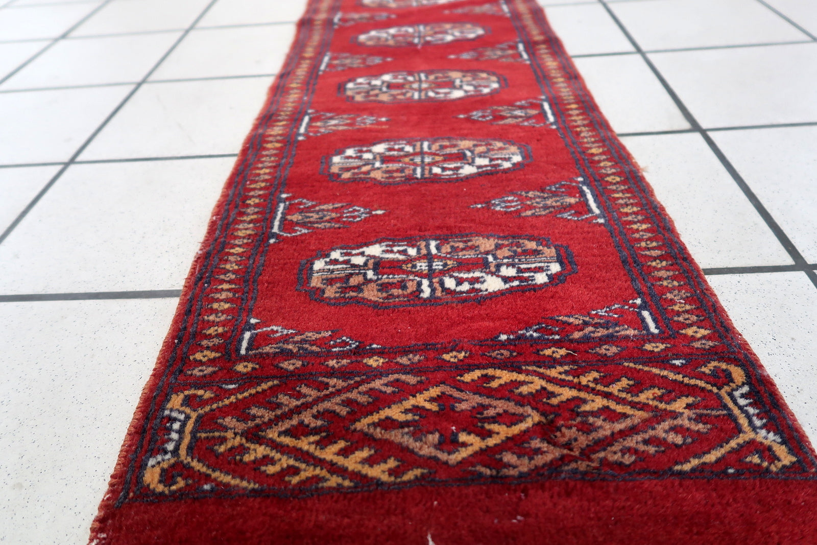 Elaborate Border Patterns Surrounding Edges of Handmade Vintage Uzbek Bukhara Rug - 1960s