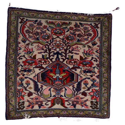 Handmade vintage Persian Tabriz rug with floral medallion design
