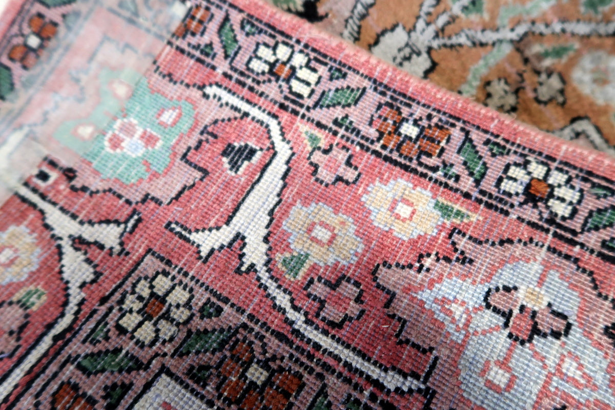 A side view of the rug’s edges, showing the craftsmanship in its border
