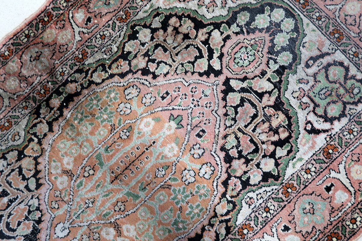 The backside of the Persian rug, showing traditional knotting techniques
