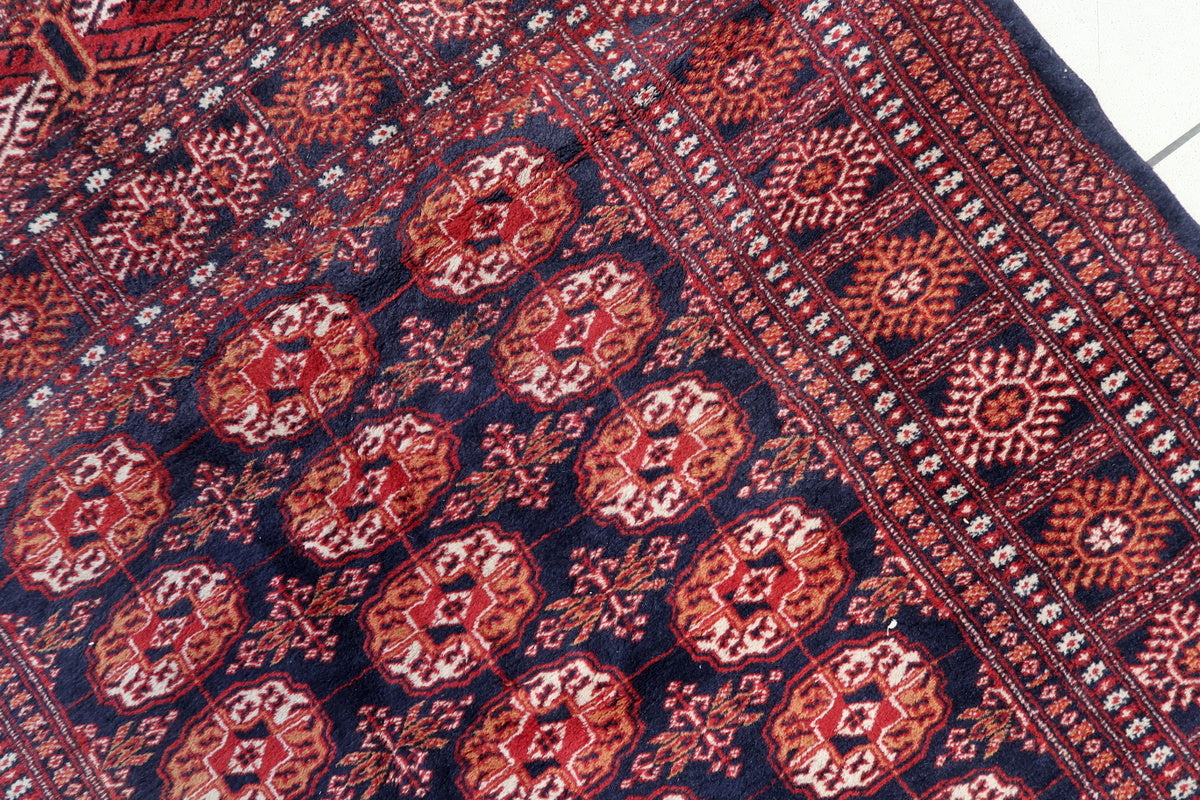 The rug hung on a wall as Central Asian textile art
