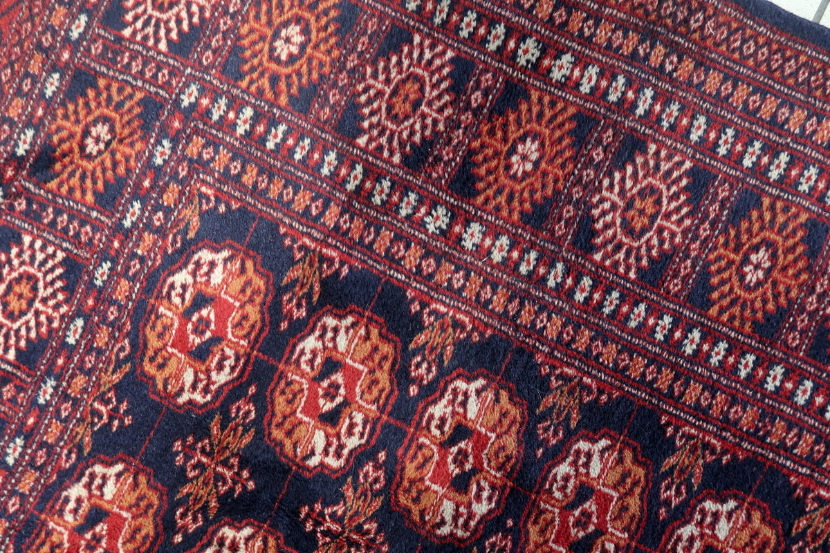 The backside of the Uzbek rug, showing traditional weaving techniques
