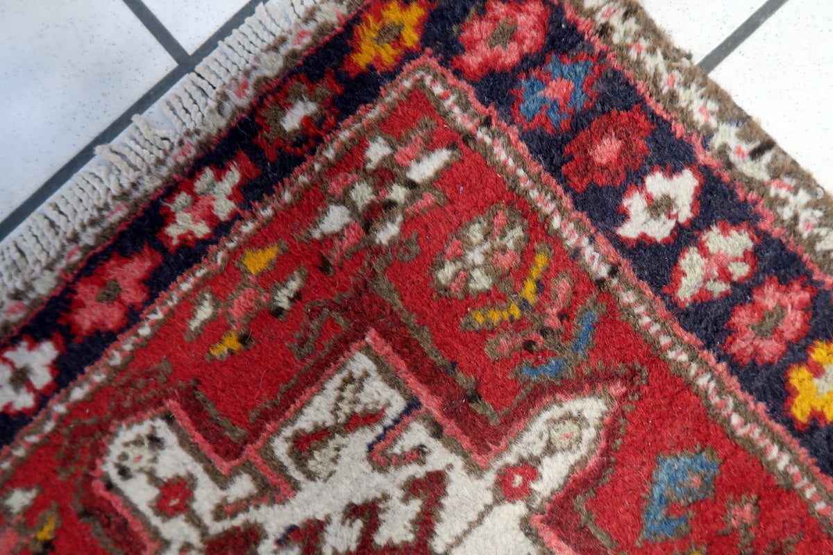 The rug placed on a traditional floor, showing its size and perfect placement in a home.
