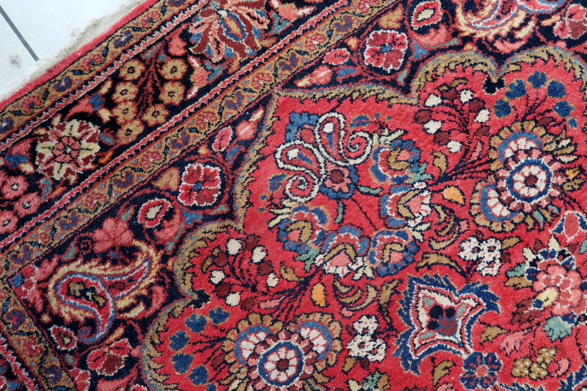 Detail of the hand-knotted wool construction and texture of the rug
