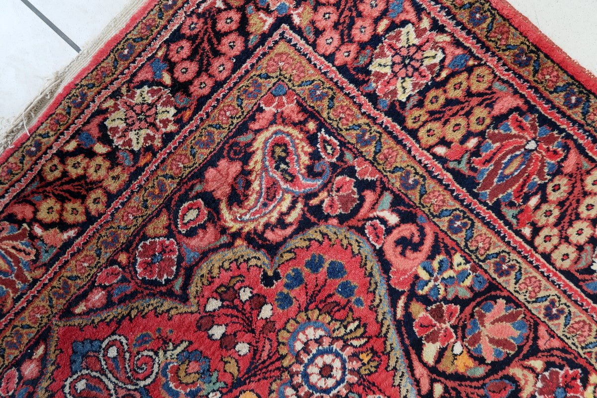 Detail of the hand-knotted wool construction and texture of the rug
