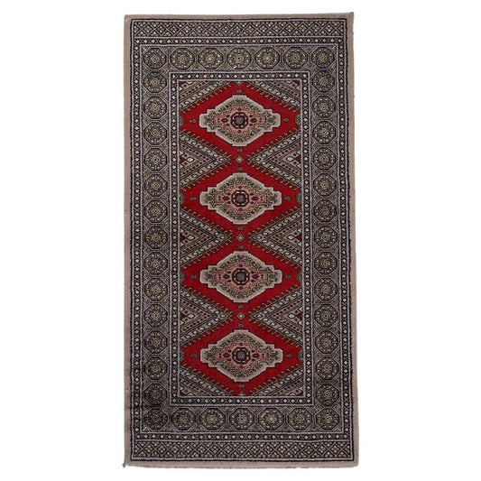 Vintage German geometric rug with red, beige, and gold diamond patterns
