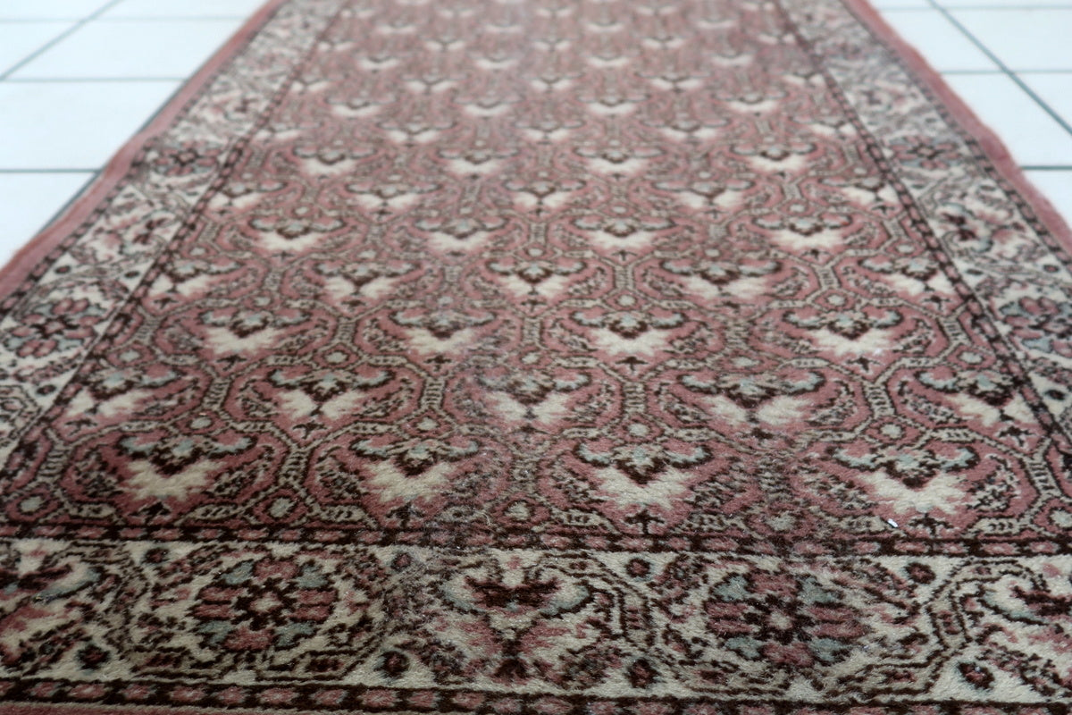 Hallway runner with intricate vintage Persian-style design
