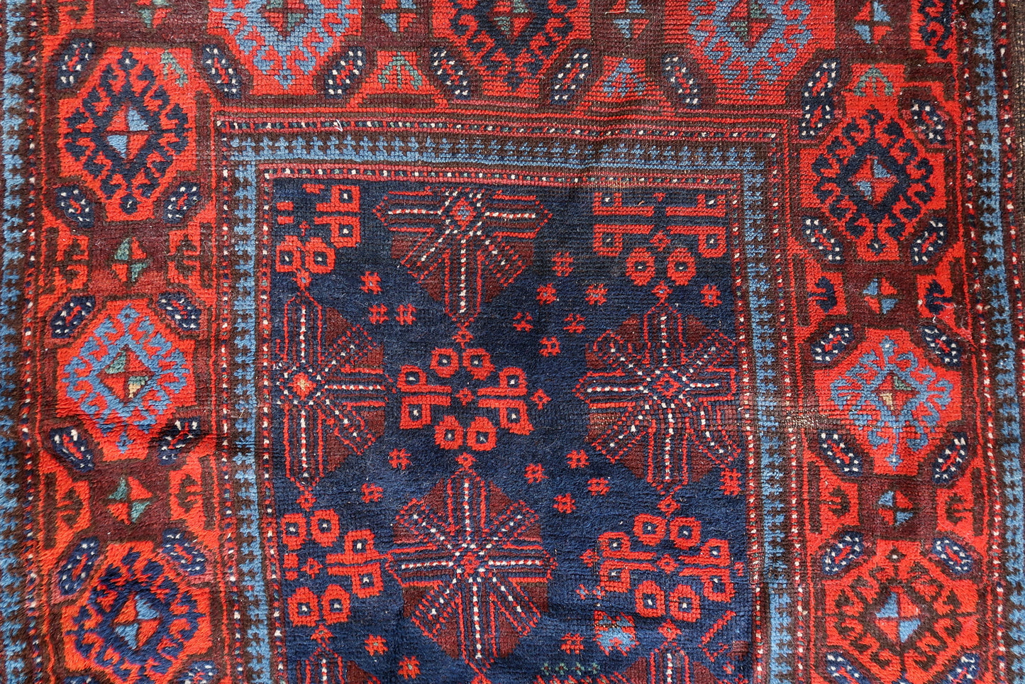 Full view of an antique 3.1' x 7.1' wool runner from Afghanistan
