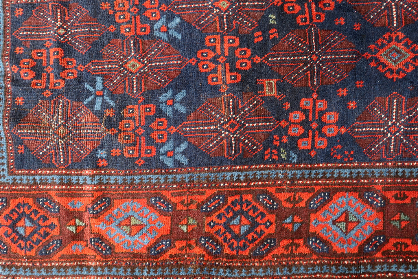 Richly colored Afghan wool rug, ideal for hallways and interiors
