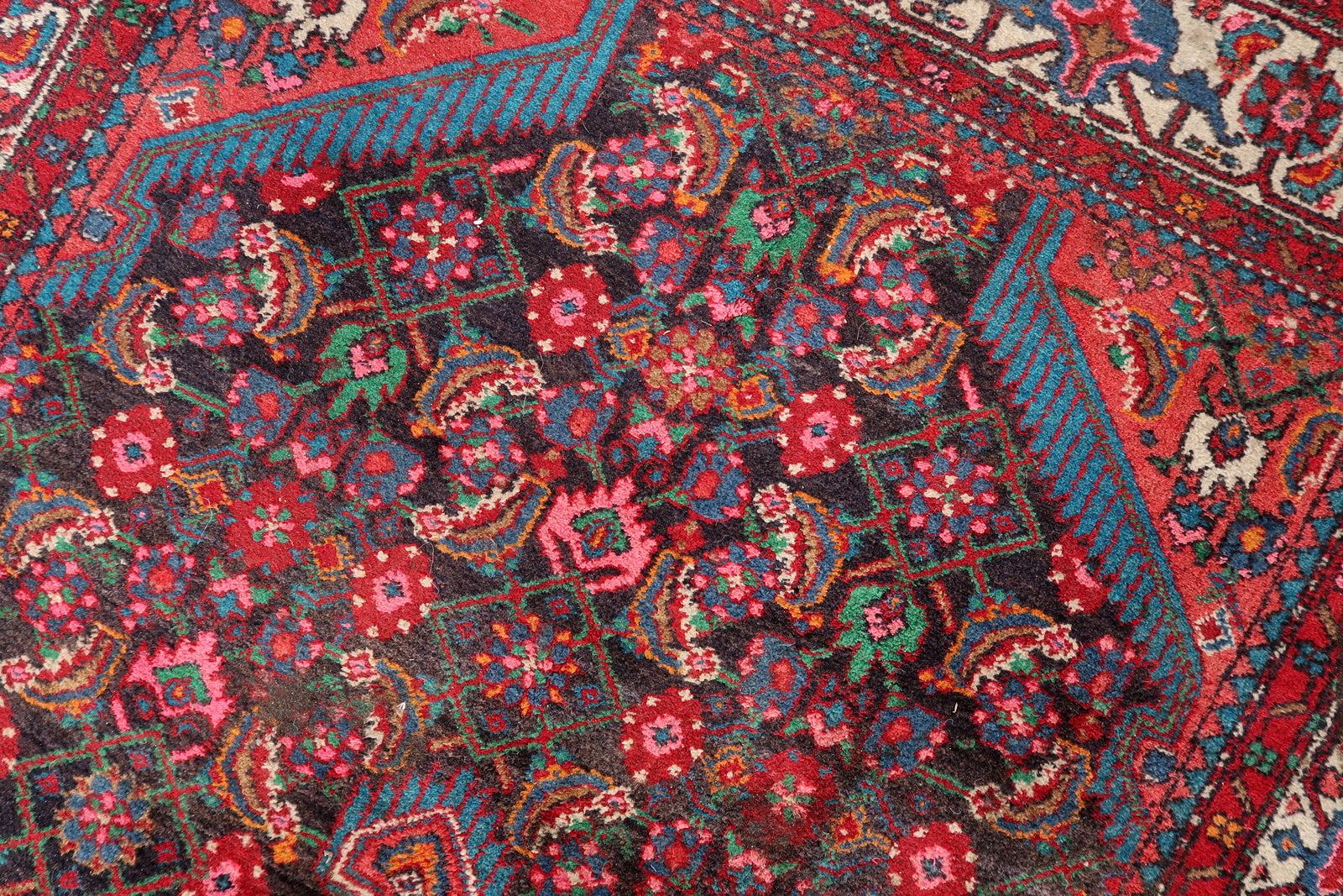 1960s Persian Malayer rug with vibrant red and navy blue tones
