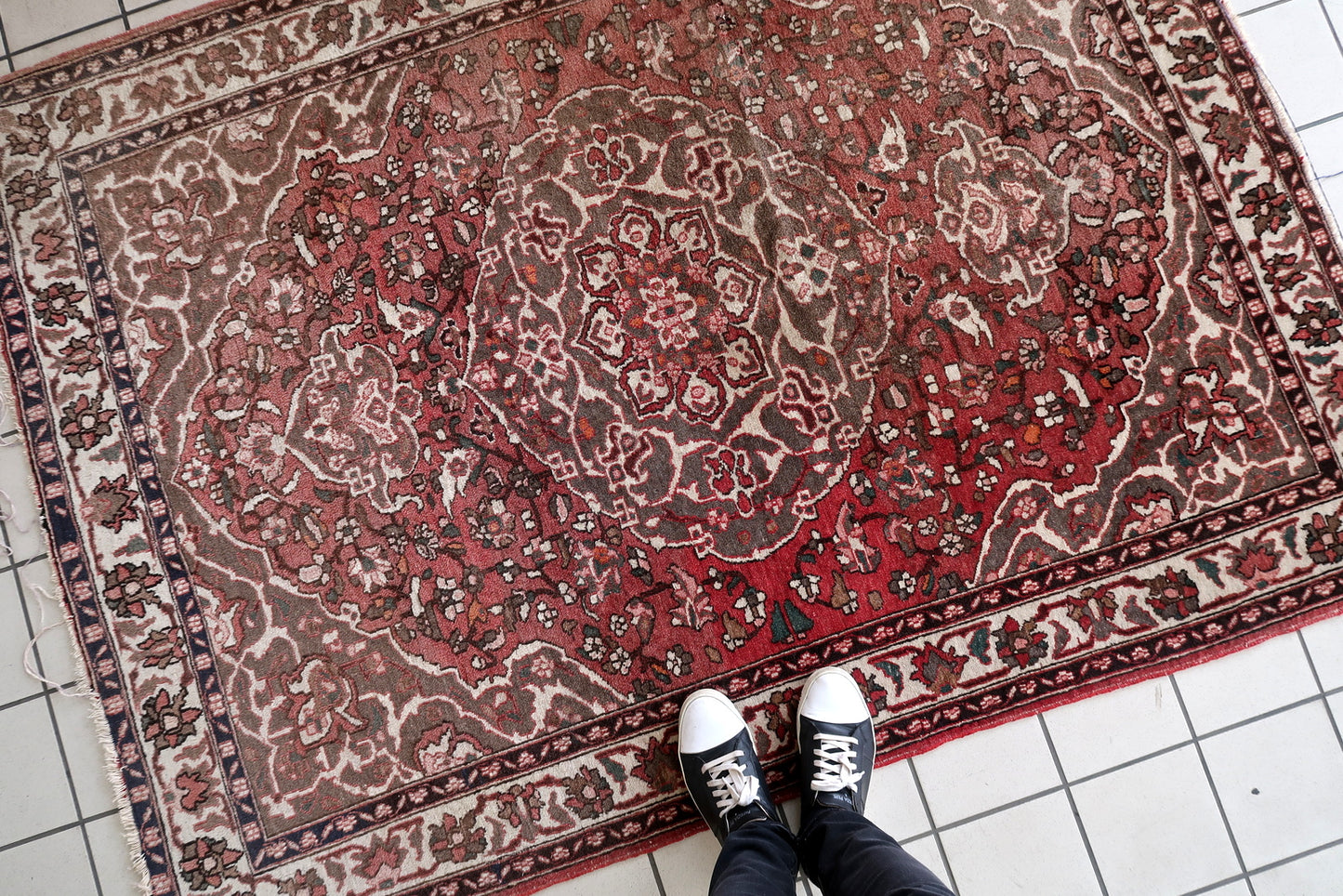 Red and beige Persian floral rug
