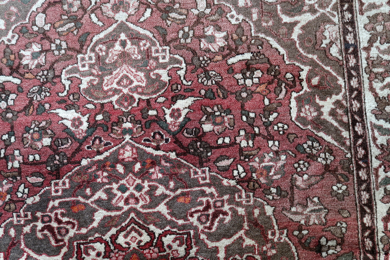 Traditional Persian wool rug design
