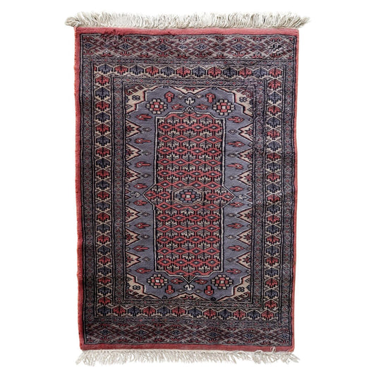 Handmade vintage Uzbek Bukhara rug
