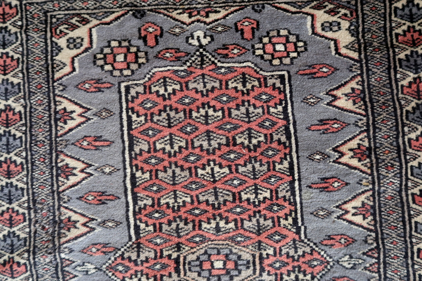 Vintage Uzbek rug red blue beige
