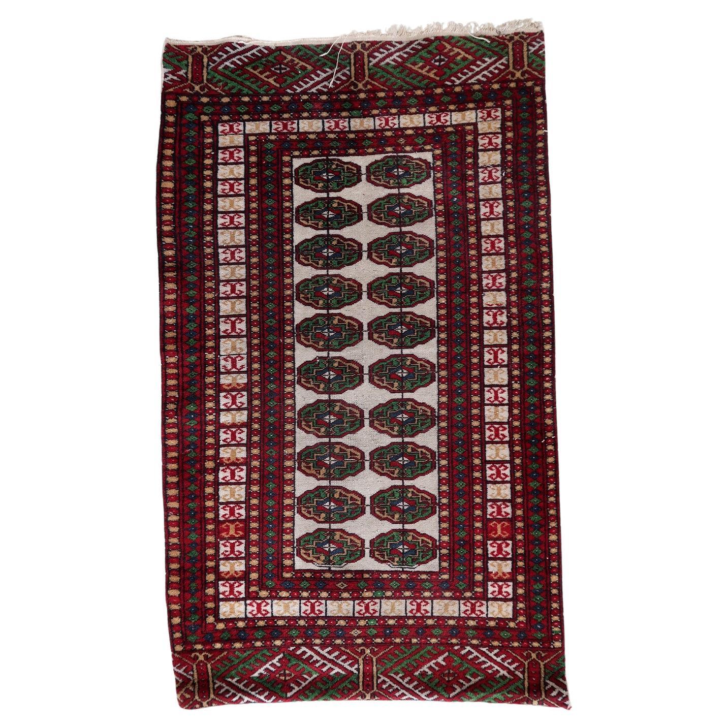 Handmade vintage Uzbek Bukhara rug
