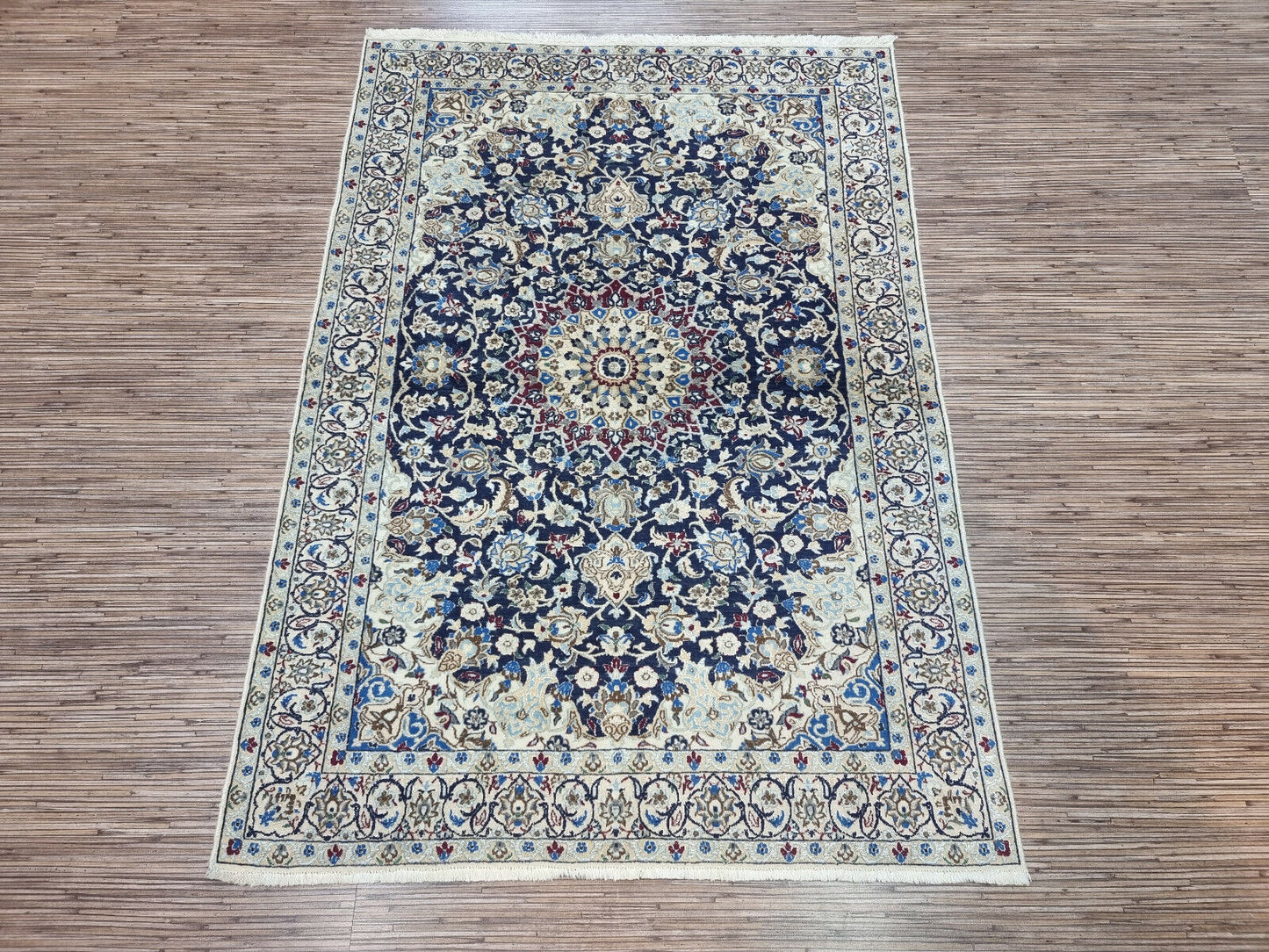 Elegant Persian-style design on the Nain rug
