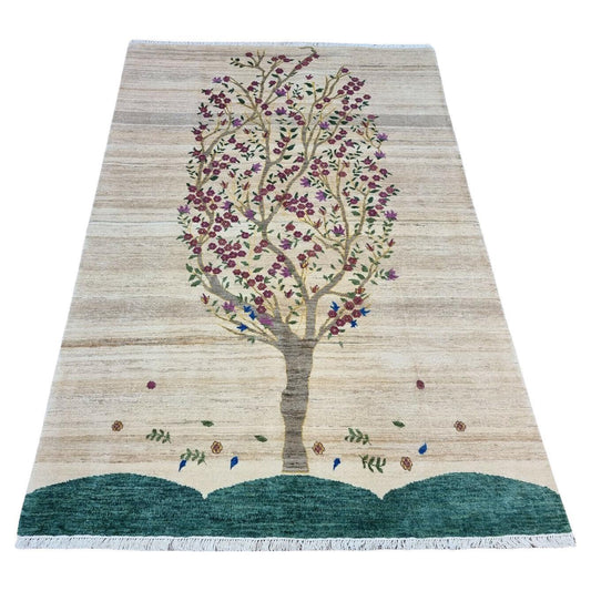 Full view of the Handmade Vintage Persian Gabbeh Rug with floral tree design
