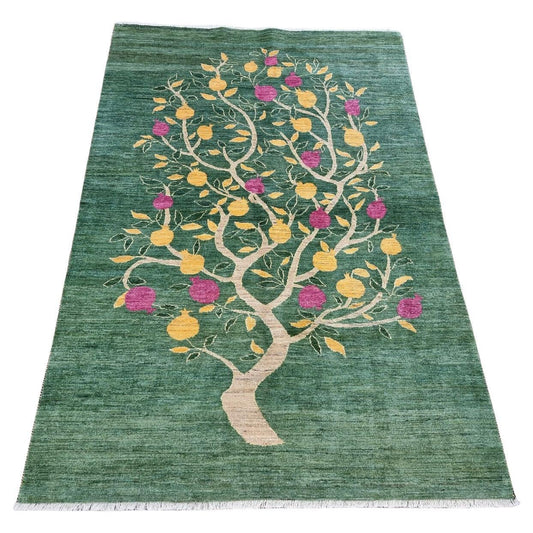 Full view of the Handmade Vintage Persian Gabbeh Rug with a tree motif
