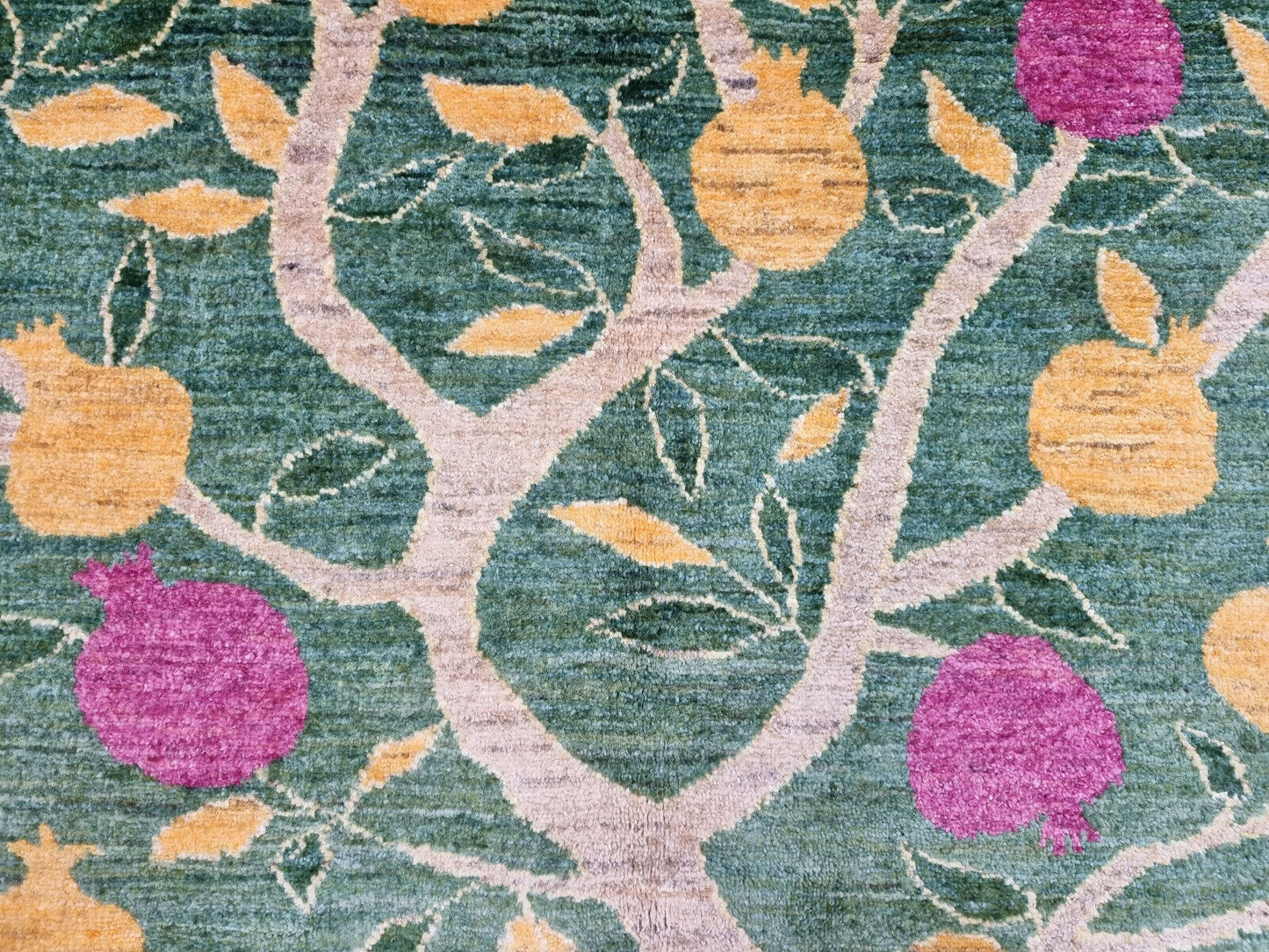 Artistic tree design in vibrant natural colors on the Gabbeh rug
