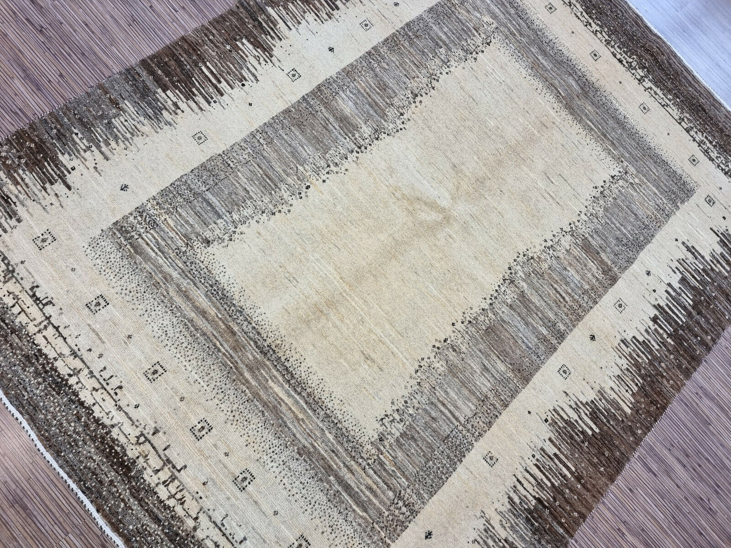 Close-up of geometric patterns on the Persian Gabbeh rug
