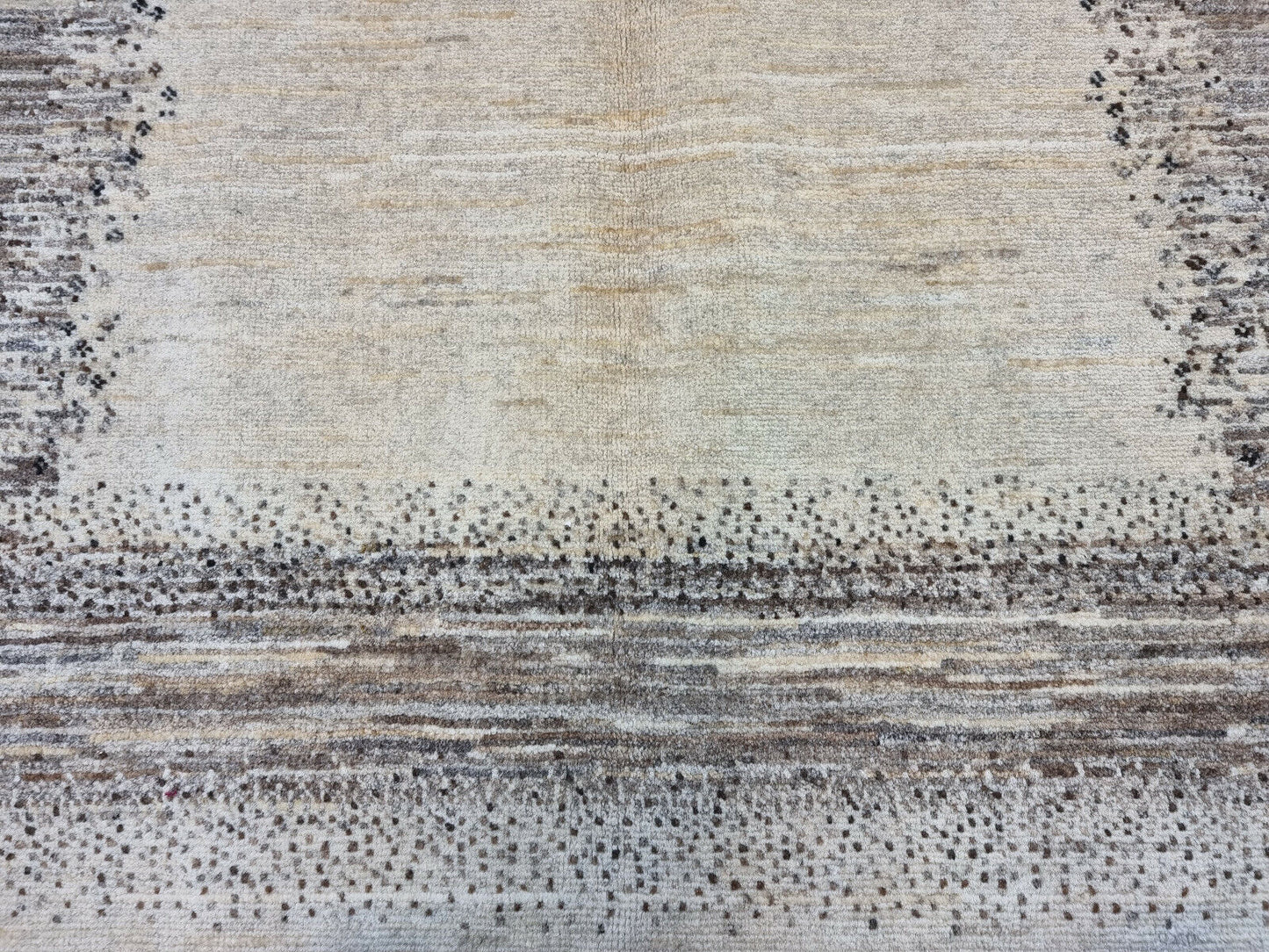 Side view highlighting the rug’s thickness and wool quality
