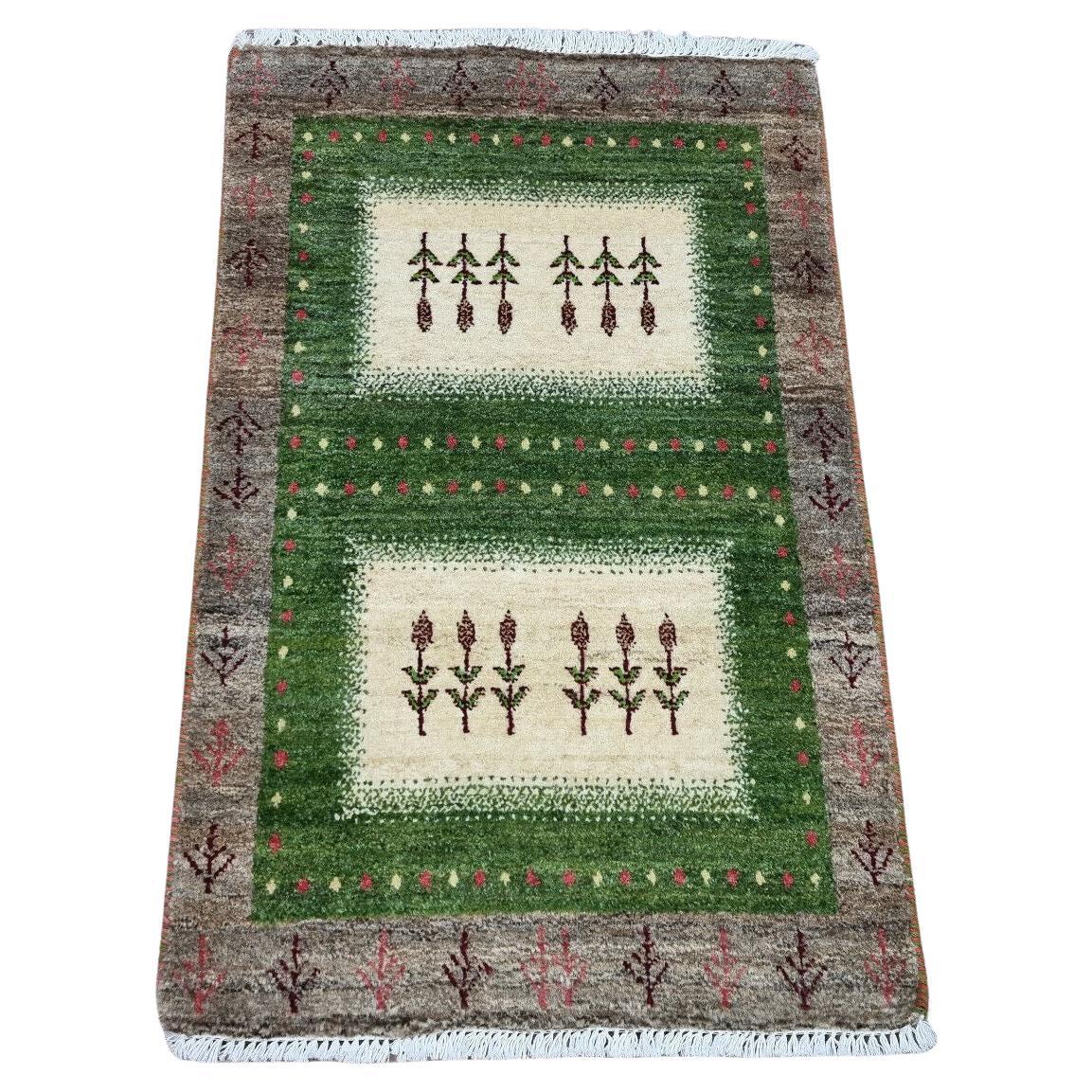 Handmade Vintage Persian Gabbeh Rug in green and beige
