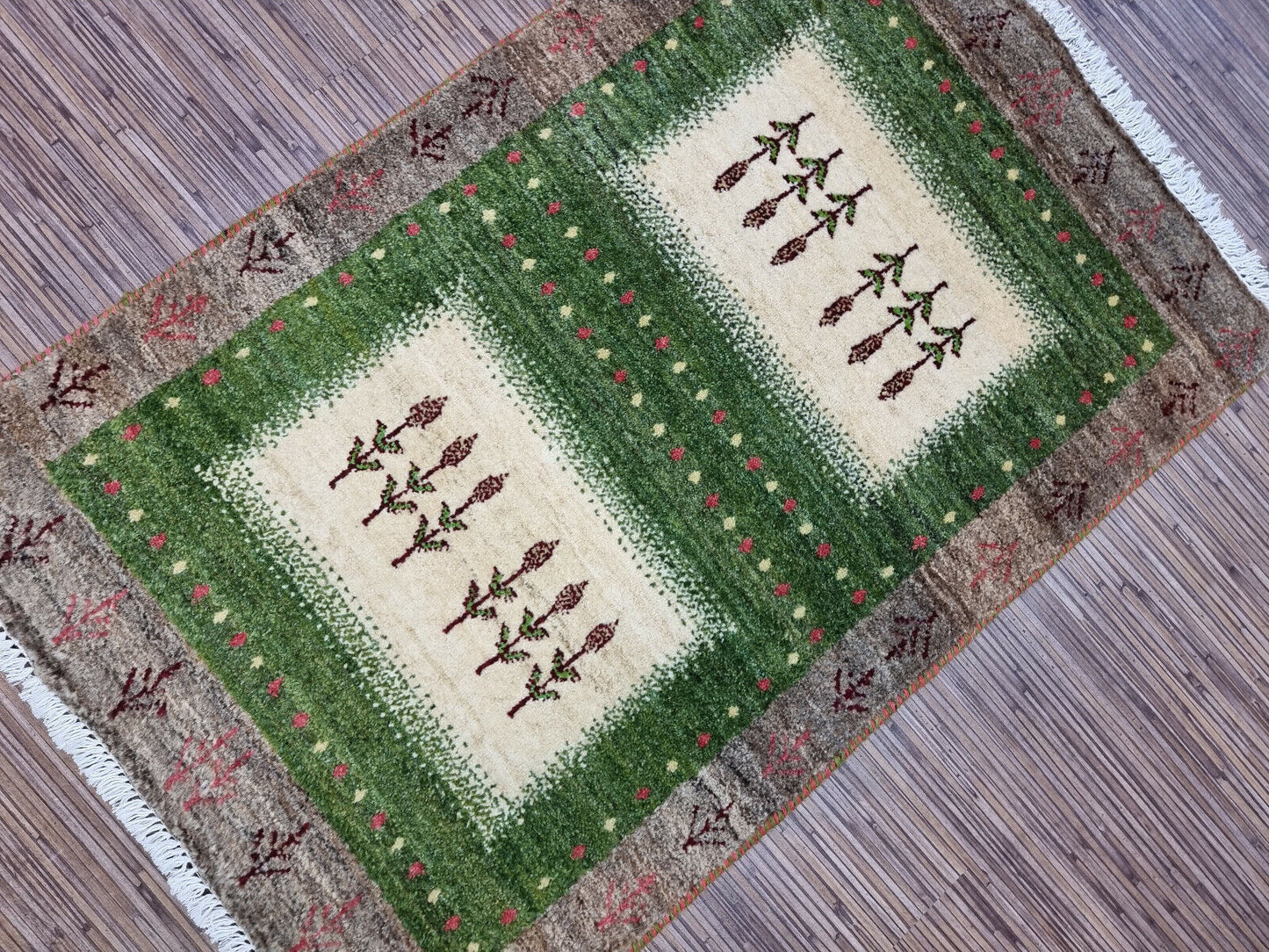 Close-up of floral patterns on the Persian Gabbeh rug
