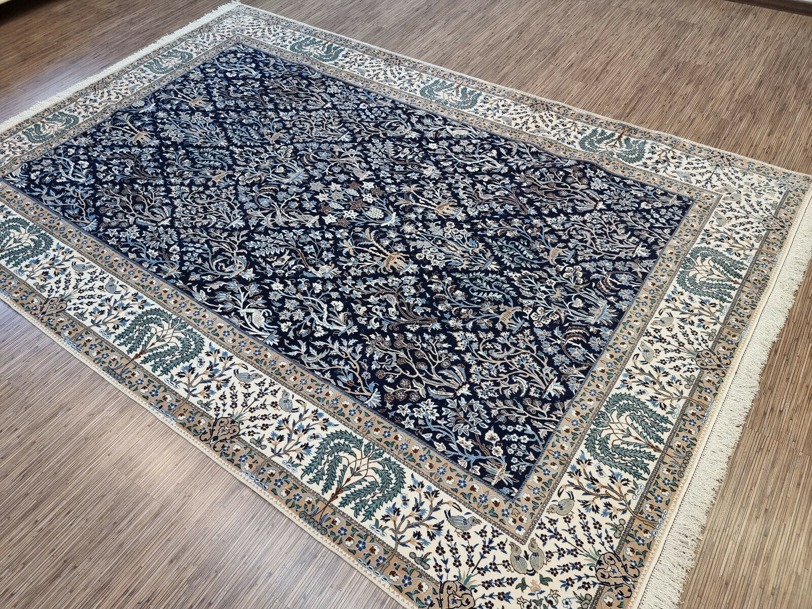 Navy blue Persian rug with cream border
