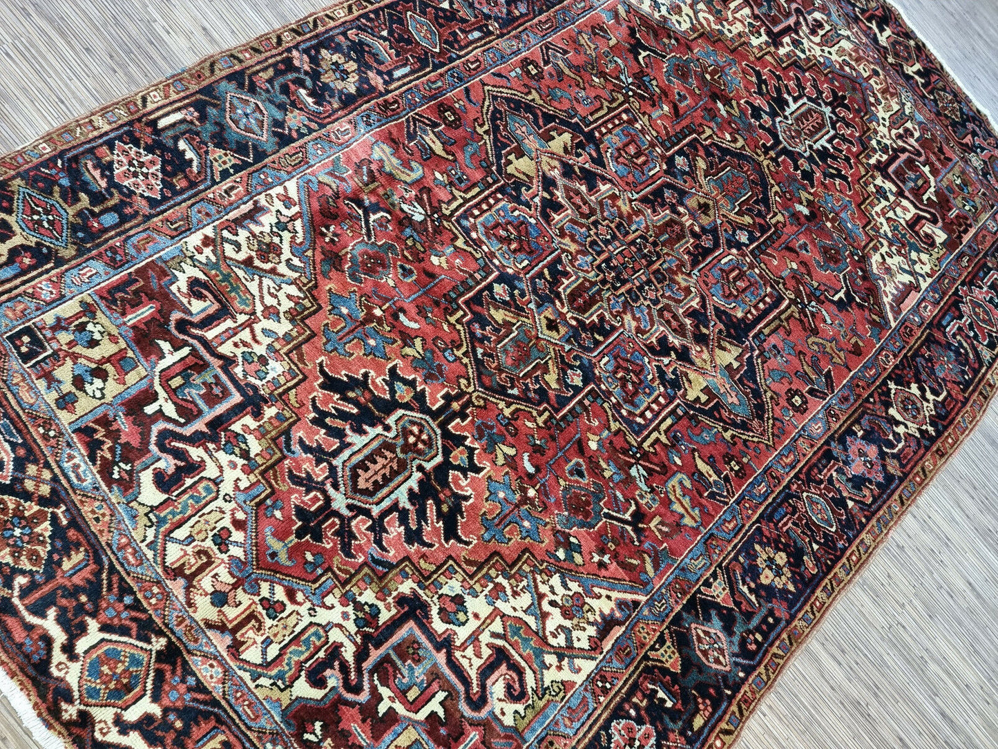 Hand-knotted Persian Heriz red and cream rug
