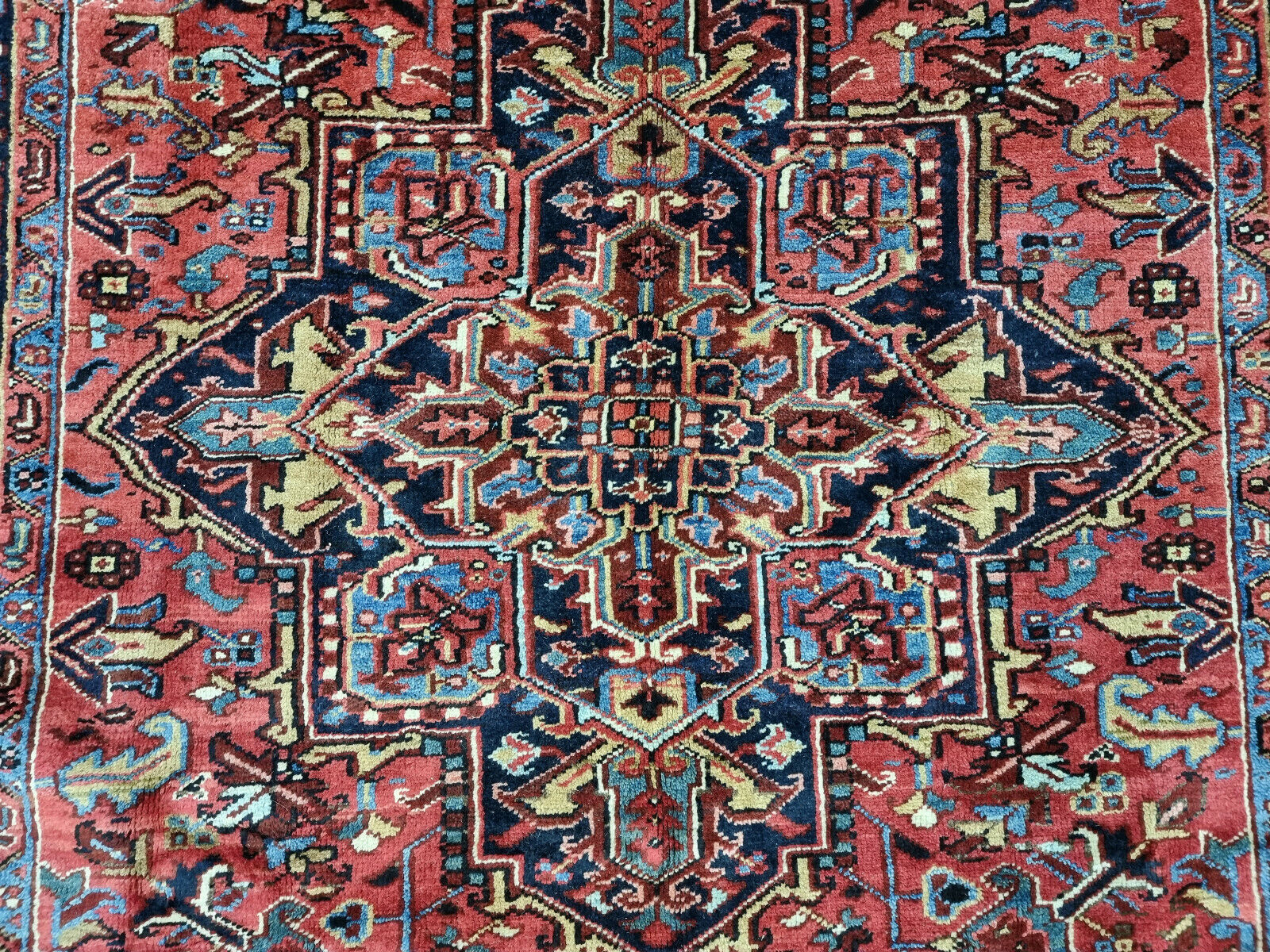 Antique Persian rug red and navy design
