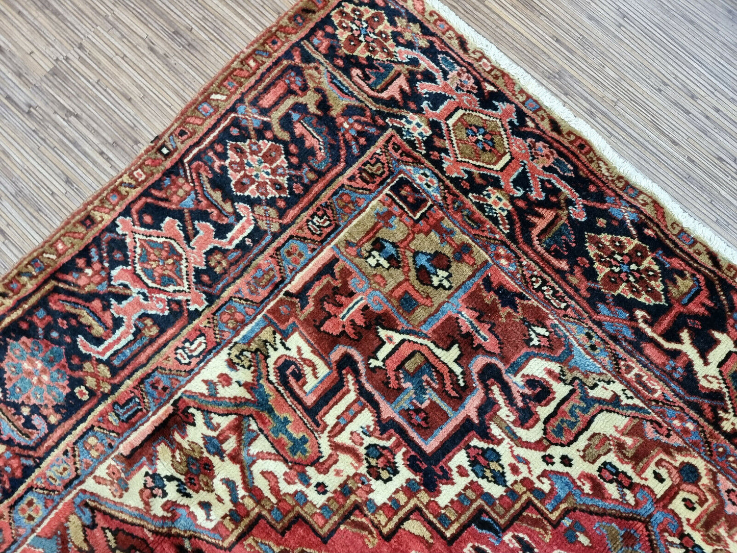 Heriz Persian carpet fringed edges
