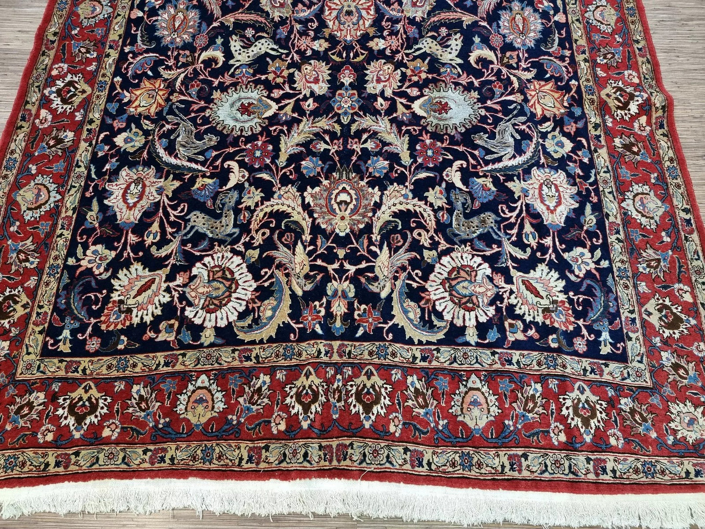 Luxurious antique Persian Qum rug details
