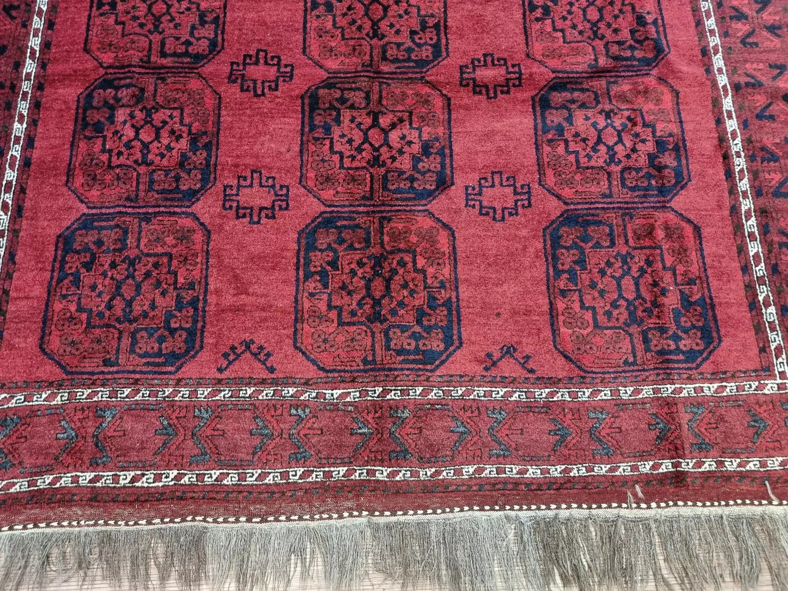 Close-up of Afghan Ersari hand-knotted wool design
