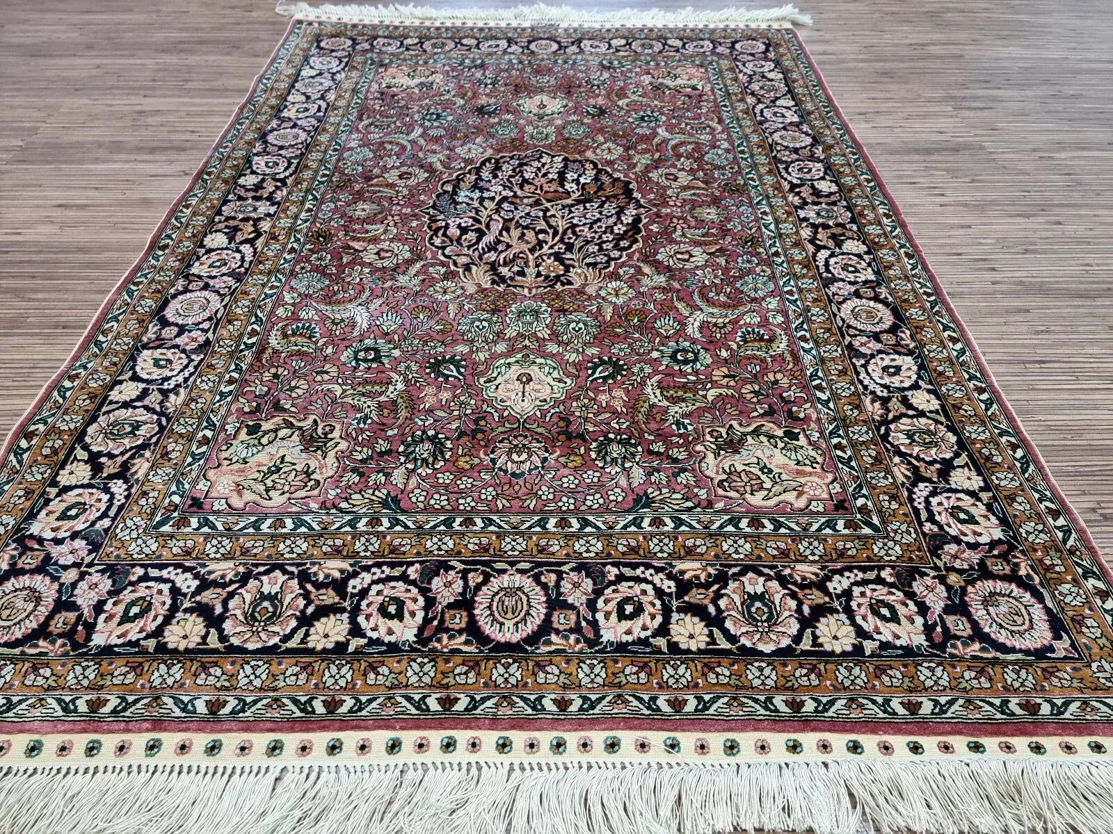 Professionally cleaned Chinese silk rug in flawless condition.
