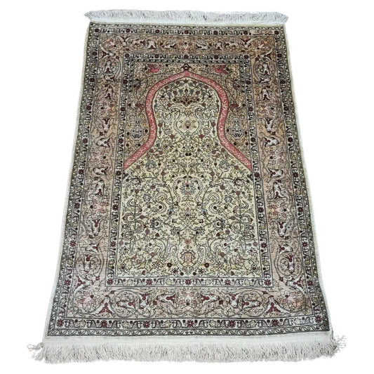 Full view of vintage Turkish Hereke silk rug
