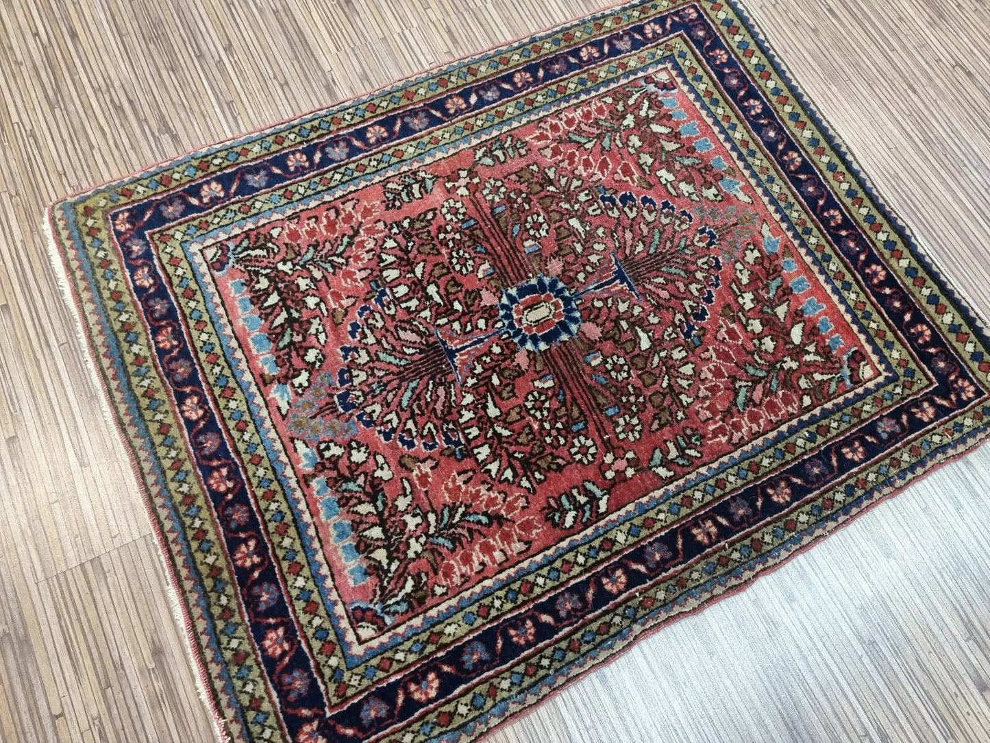 Authentic 1920s Persian-inspired rug with classic Oriental charm
