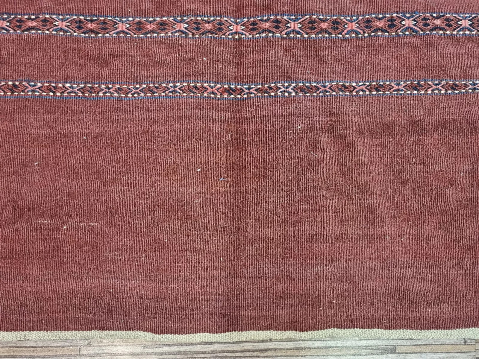 Side view of a rare collectible Turkmen Sumak textile bag
