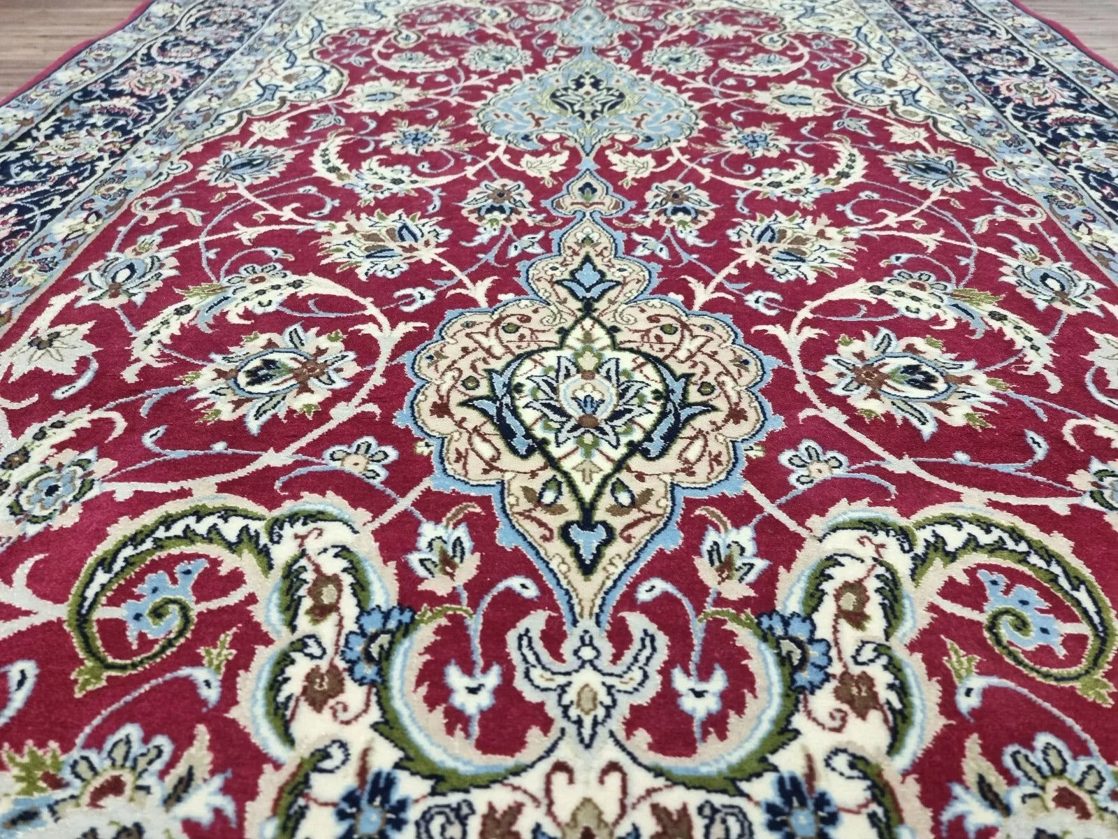 Close-up of a luxurious Kork wool Persian rug, showing fine hand-knotted craftsmanship
