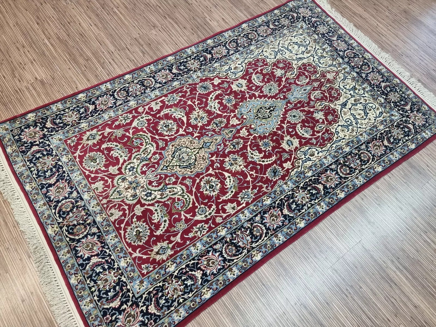 Hand-knotted Persian Isfahan rug with a rich color palette and high knot density
