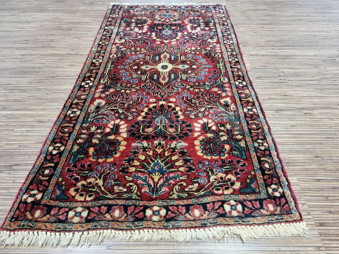 Hand-knotted Persian Sarouk area rug
