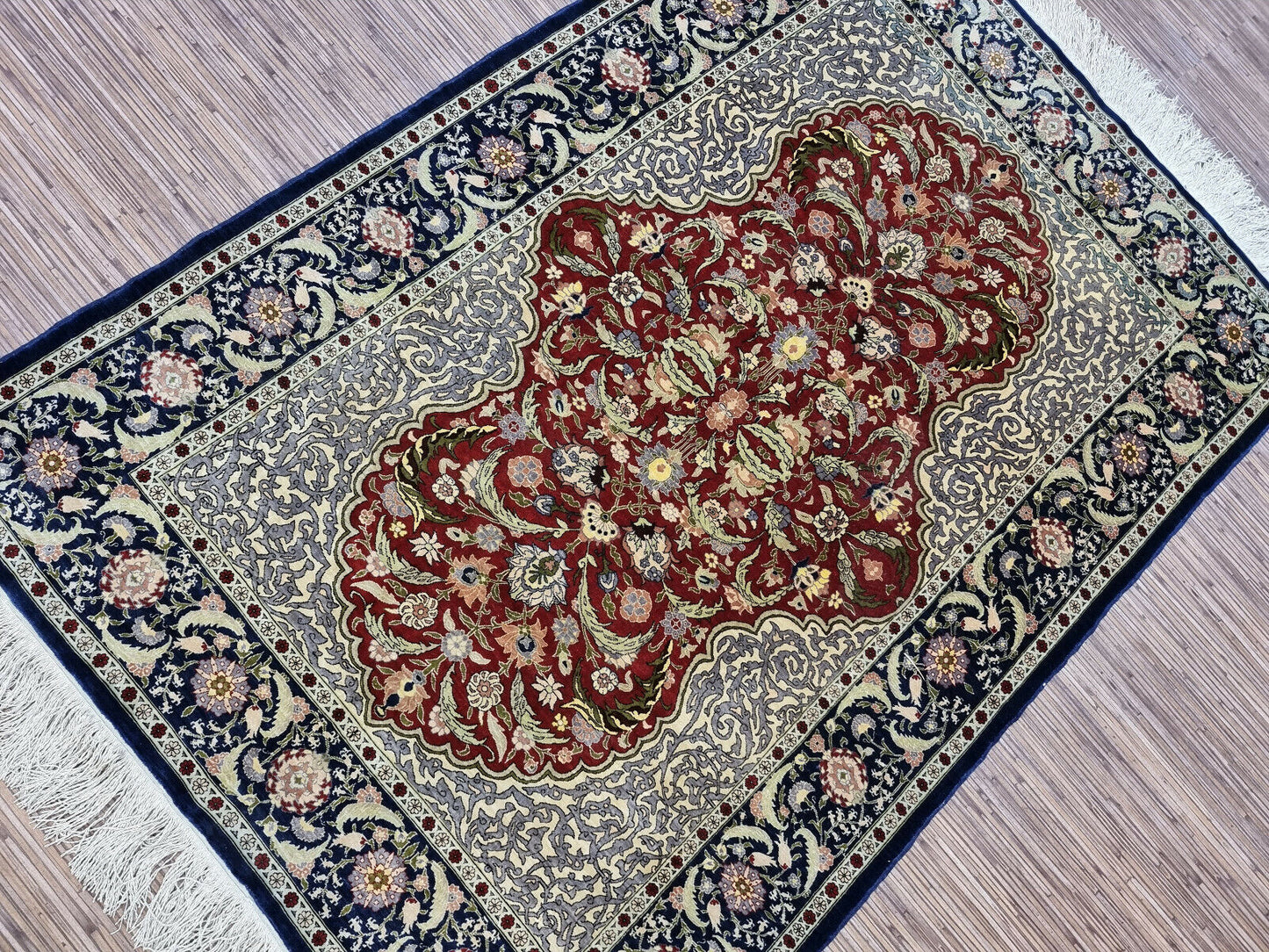 Intricate Turkish Hereke rug design
