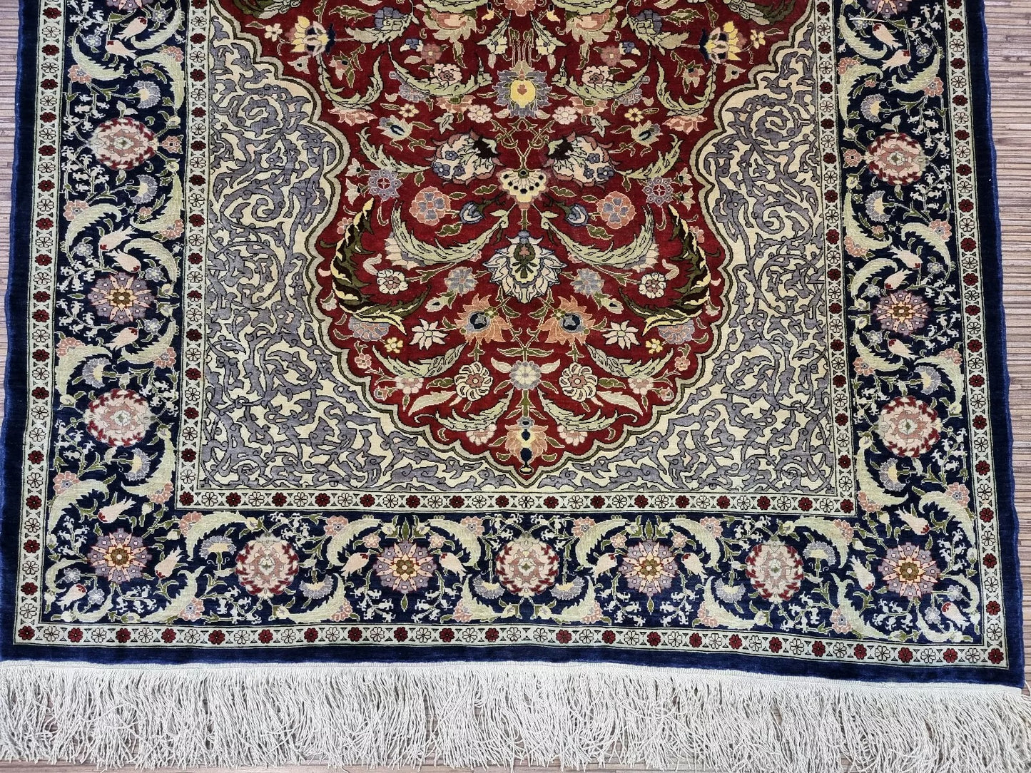 Hand-knotted silk Hereke area rug
