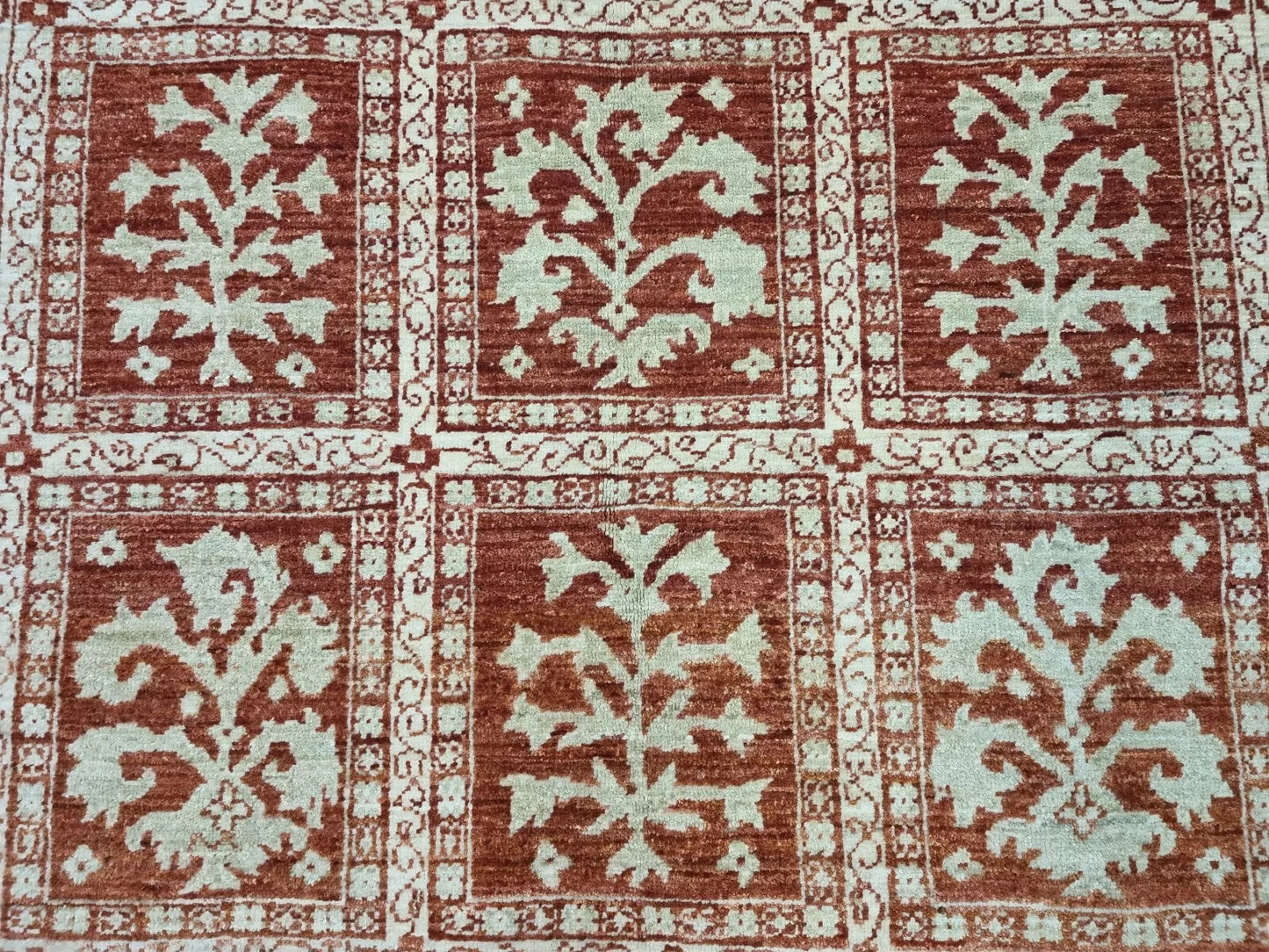 1980s Afghan wool rug – floral motifs
