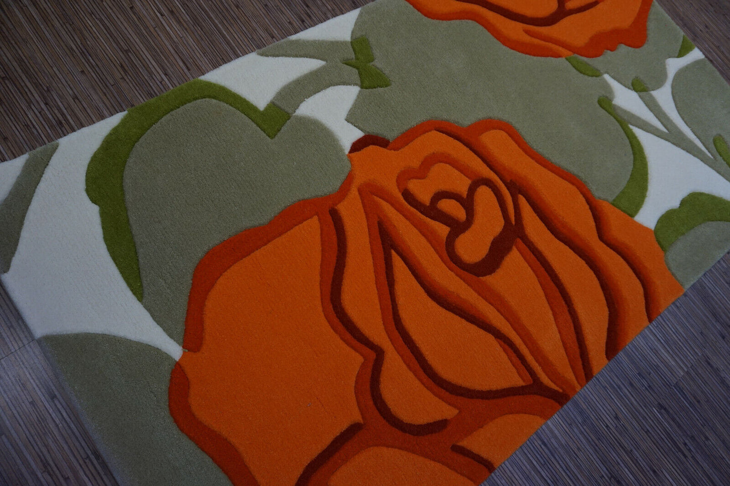 Close-up of rose motif on Hand-Tufted Vintage Chinese Rug - Detailed view showcasing the intricate rose pattern in green and red shades, adding elegance to any room.