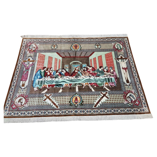 Vintage Qum silk rug in rich reds, blues, and creams (1970s).