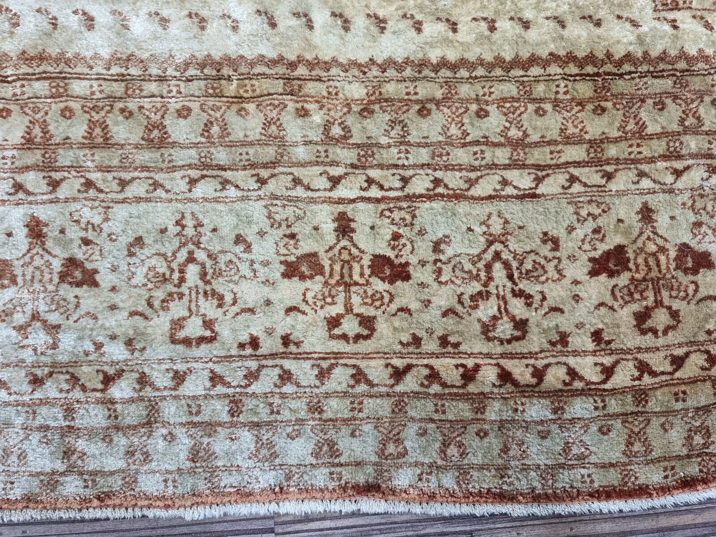 Antique Silk Tabriz Prayer Rug (Early 20th Century): Ideal for adding a touch of sophistication and cultural heritage to any space. (Close-up of section in a styled setting)