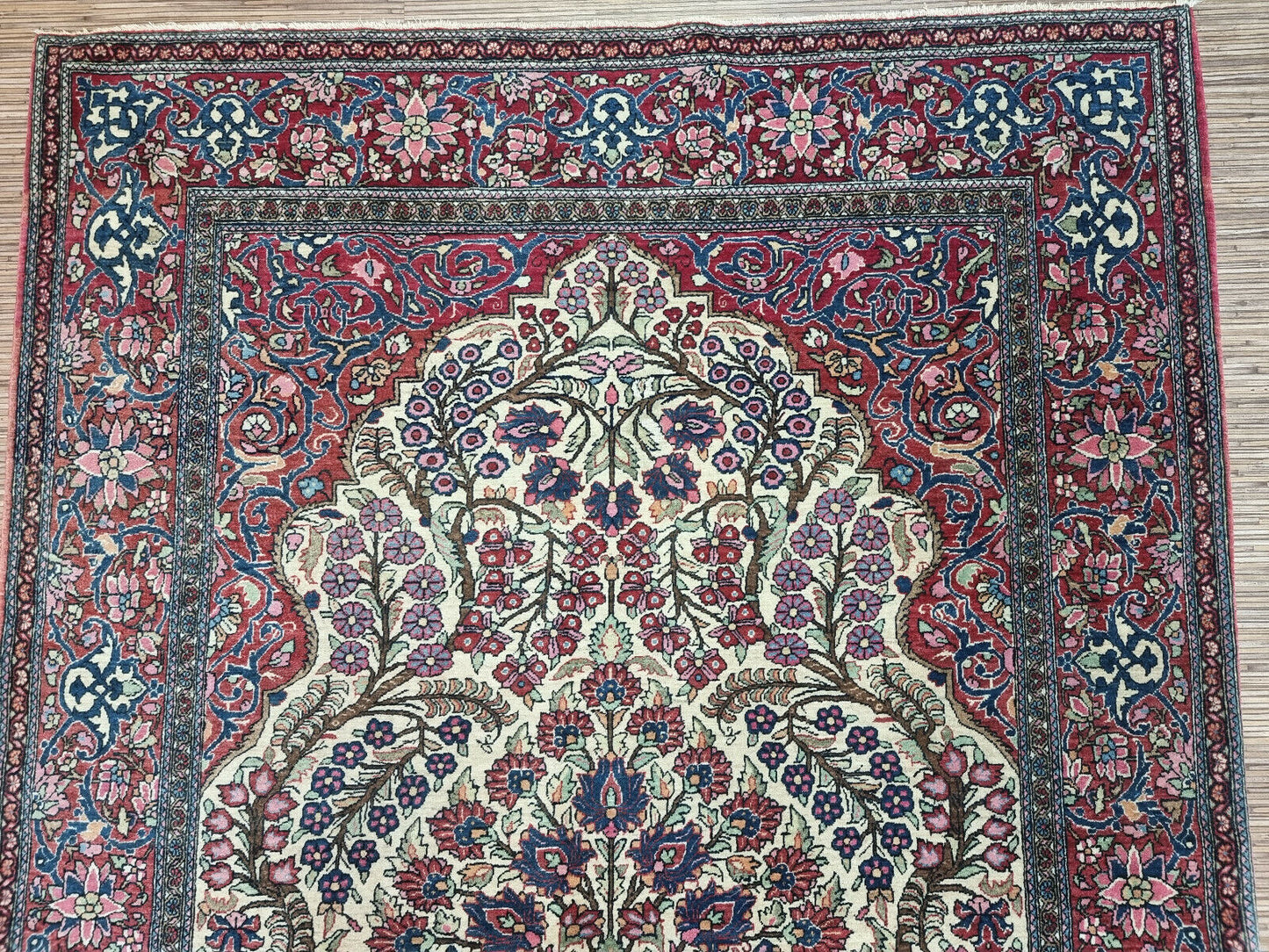 Vintage Wool Isfahan Prayer Rug (1900s): Subtle signs of wear add to the rug's authenticity and rich history. (Close-up)