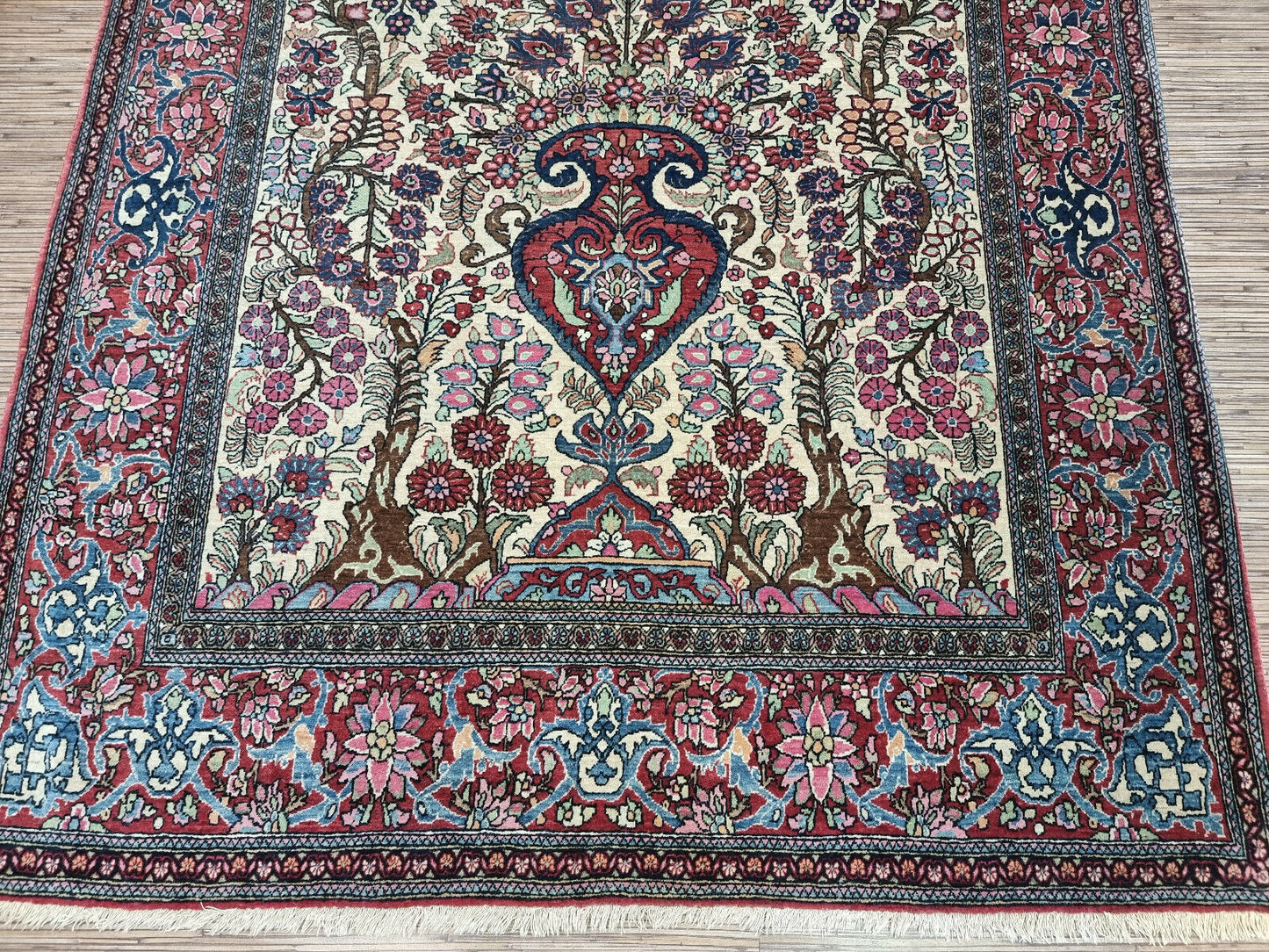 Vintage Wool Isfahan Prayer Rug (1900s): A perfect conversation starter and a unique piece of art for your home. (Close-up of section in a styled setting)