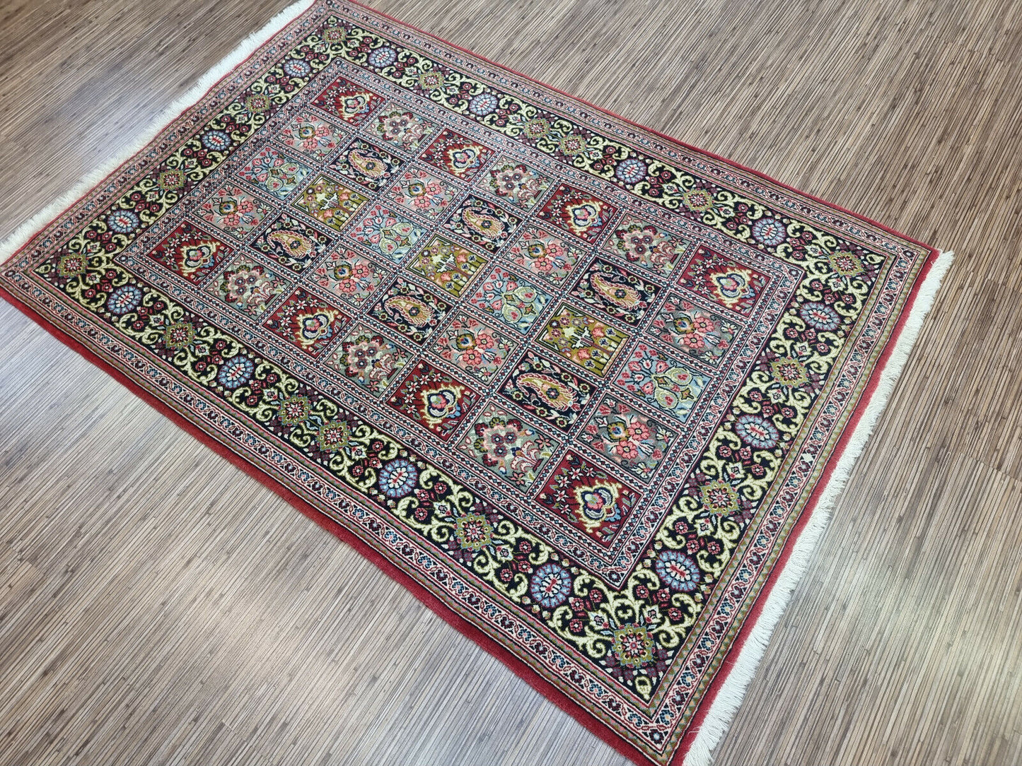 Art for your Floor: Vintage Persian Rug (3.6' x 5.1') - a captivating blend of geometric & floral patterns in rich colors.